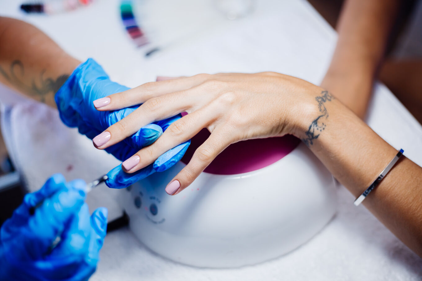 female-hands-finger-nail-treatment-making-process-professional-nail-salon
