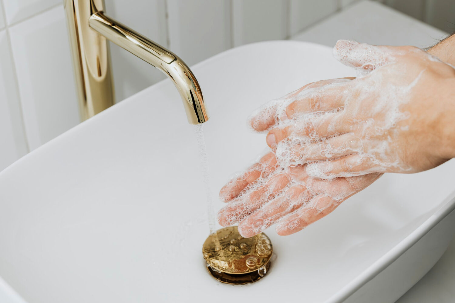man-washing-hands-with-soap