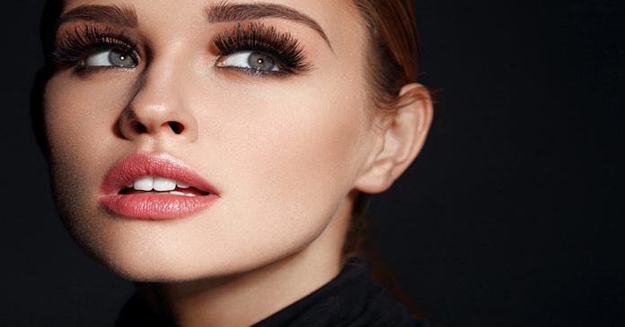 Beauty Woman Face. Beautiful Female With Makeup, Long Eyelashes