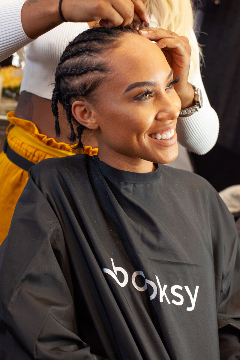 woman in salon loving Chicago weaves