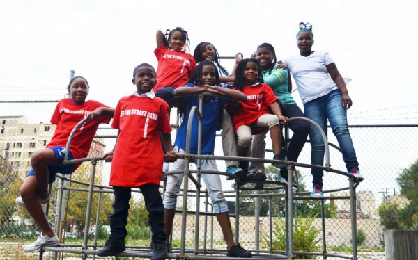 off the street club kids on a playground